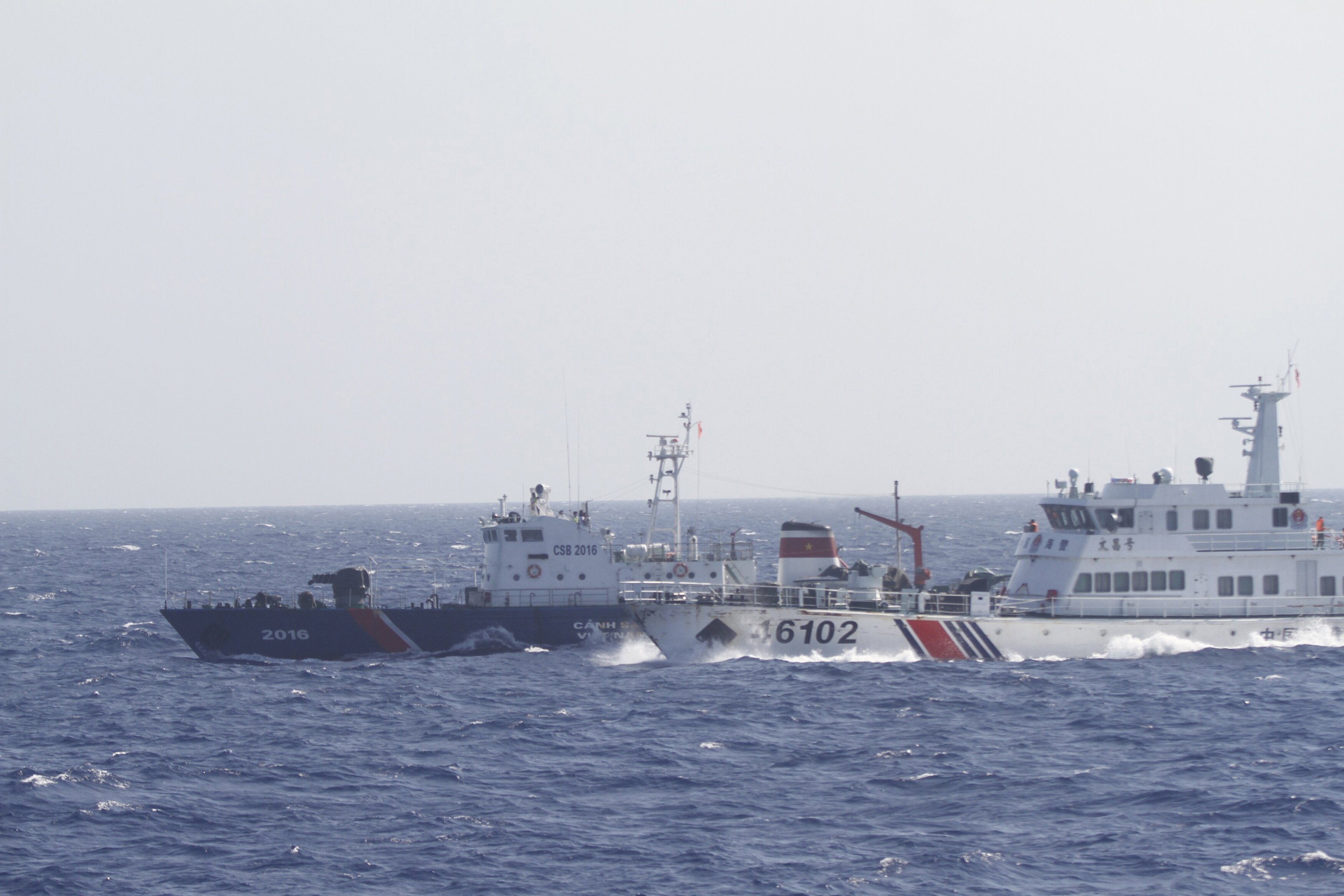 A ship of Chinese Coast Guard is seen near a ship of Vietnam Marine Guard in the South China Sea, about 210 km (130 miles) off shore of Vietnam on May 14, 2014. (Nguyen Ha Minh/Reuters)