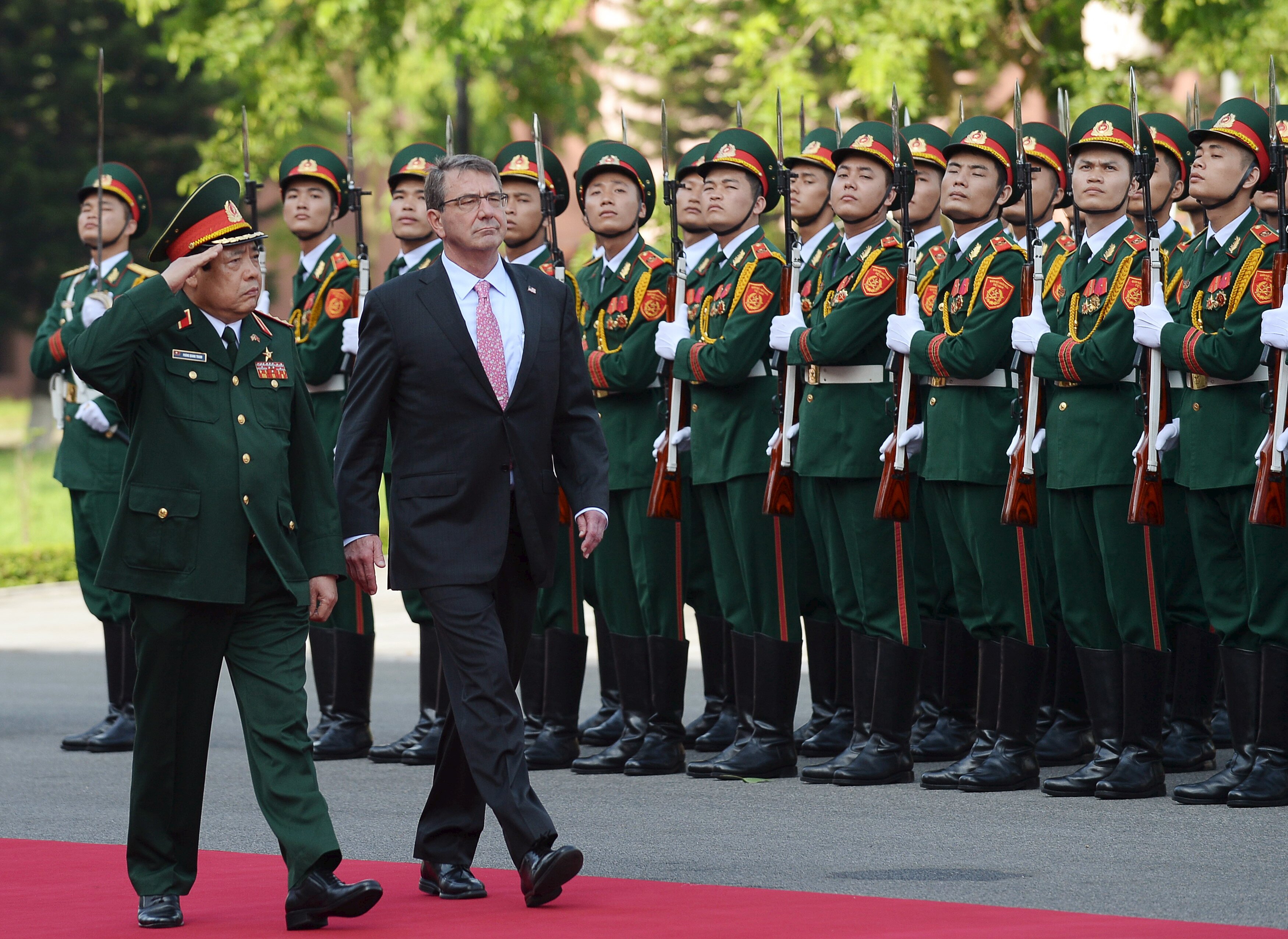 U.S. Defense Secretary Ash Carter and Vietnam's Defense Minister Phung Quang Thanh review the guard of honour during a welcoming ceremony at the Defense Ministry in Hanoi, Vietnam, on June 1, 2015. (Hoang Dinh Nam/Pool/Reuters)